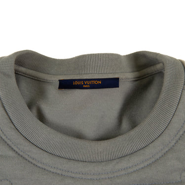 The inside label of the Louis Vuitton Embroidered Plastron T-Shirt.