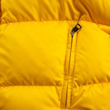 The pocket of the Moncler Venice Yellow Puffer Jacket.