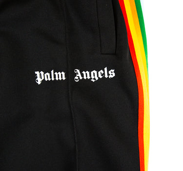 The front logo of the Palm Angels Black Rainbow Sweatpants.