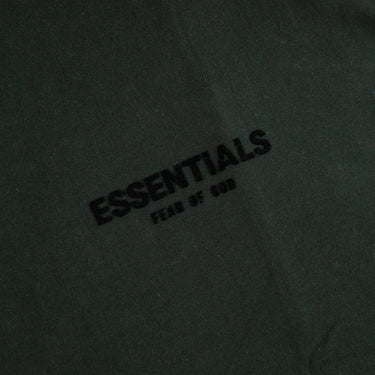 The logo of the Fear Of God ESSENTIALS Stretch Limo T Shirt.