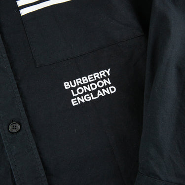 The logo of the Burberry London England Black Shirt.