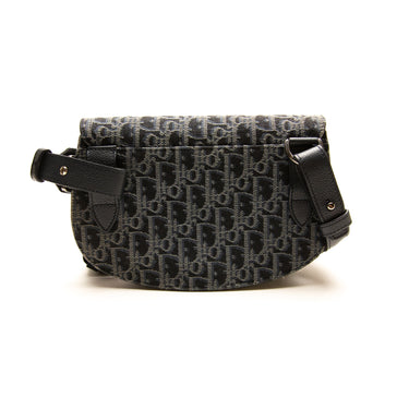 The back of the Dior Black Oblique Saddle Bag.