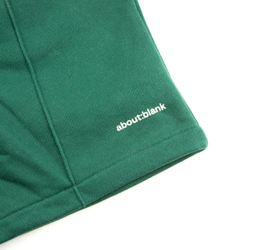 The logo of the about:blank Green Shorts.