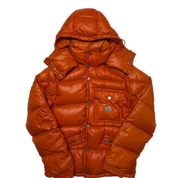 The front of the Moncler K2 Orange Puffer Jacket.