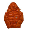 The front of the Moncler K2 Orange Puffer Jacket.