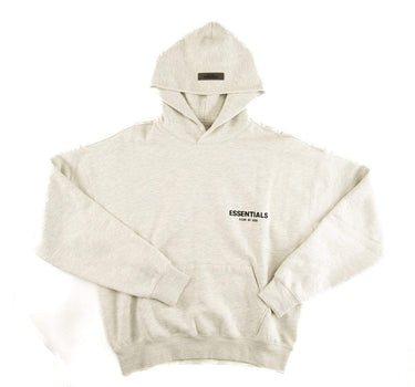 The front of the Fear Of God ESSENTIALS Light Oatmeal Hoodie L.