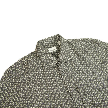 The collar and buttons of the Burberry TB Monogram Silk Shirt.