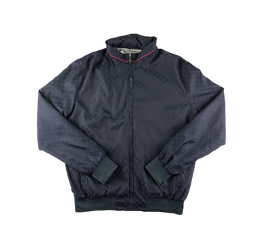 The front of the Gucci Navy Monogram Jacket.