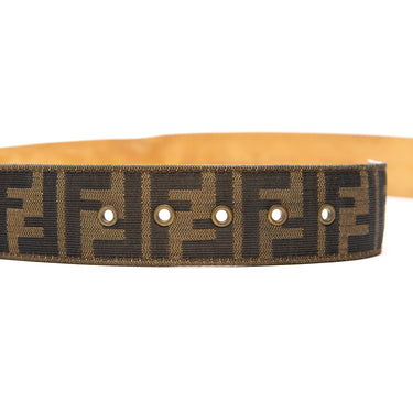 The belt holes of the Fendi Canvas FF Buckle Belt.