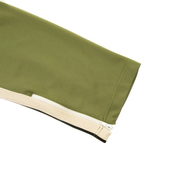 The leg of the Palm Angels  Khaki Sweatpants S.