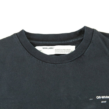 The inside label of the Off-White 2013 Cutout Arrows Black T-Shirt.