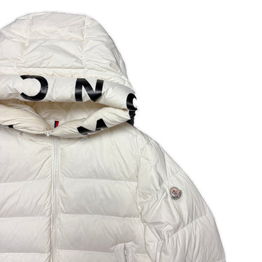 The logo of the Moncler White Salzman Puffer Jacket.