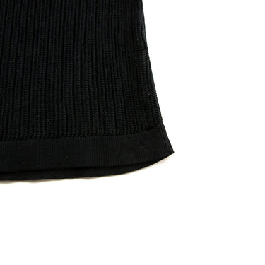 The detail of the Aime Leon Dore Mesh Knit Black Polo.