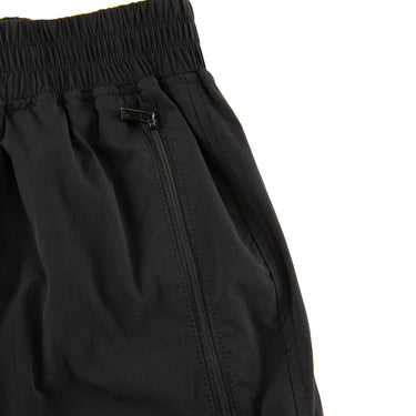 The pocket of the Represent Black Cargo Trousers.