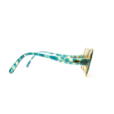 The side of the Dior 2411 50 Sunglasses.