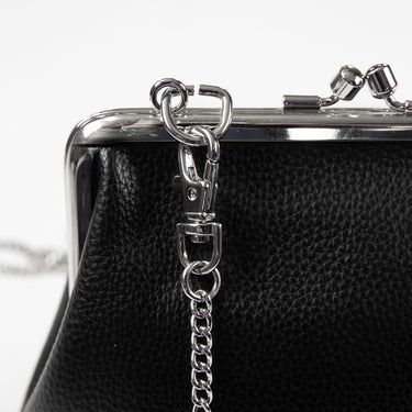 Shows the clasp of the Vivienne Westwood Vegan Granny Frame Purse in Black.