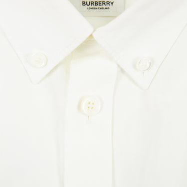 The collar of a Burberry white button-up shirt.