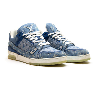 The side of the Louis Vuitton LV Denim Monogram Trainer.