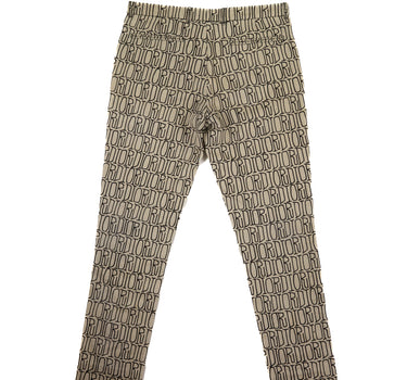 The back view of Dior x Stussy All Over Jeans in beige showcasing a unique all-over design.