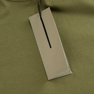 The tags of the Dior CD Icon Olive Green T-Shirt.