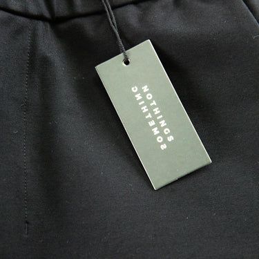 The tags of the nothings something Black Classic Pants.