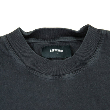 The label of the Represent Welcome To The Jungle T Shirt.