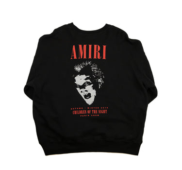The back of the Amiri Black A/W18 Children of the Night Vampire Sweatshirt showing a large vampire graphic logo with a glittery effect.