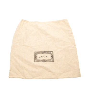 The dustbag of the Gucci Small Dahlia Black Tote Bag.