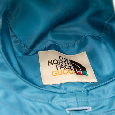 The inside label of the Gucci x The North Face Bucket Hat.