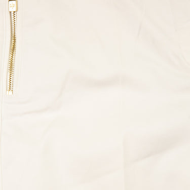 The zip of the Loro Piana White Bermuda Cotton Shorts with Gold Detailing.