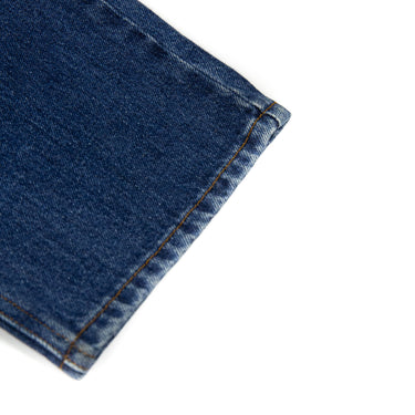 The leg hem of the Burberry Red Horseferry Print Jeans.