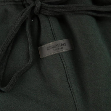 The logo of the Fear Of God ESSENTIALS Stretch Limo Sweatshorts Shorts XS.