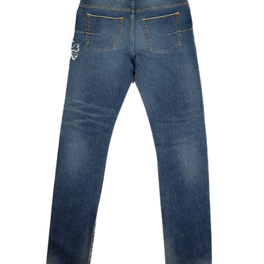 The back view of Dior x Stussy Bee Embroidered Jeans.