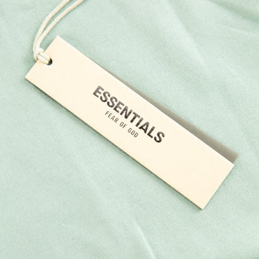 The tags of the Fear Of God ESSENTIALS.