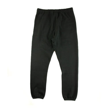 The back of the Fear Of God ESSENTIALS Stretch Limo Sweatpants.