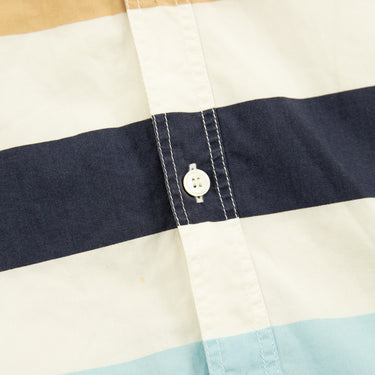 The buttons of the Burberry Striped Short Sleeve Shirt.