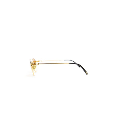 The side of the Cartier Plated Oval Sunglasses with Custom Cognac Gradient Lenses.
