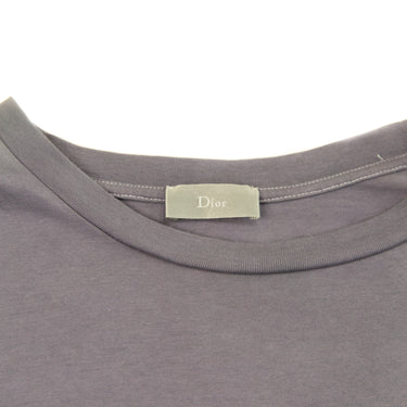 The inside label of the Dior Atelier Purple Dyed T-Shirt .