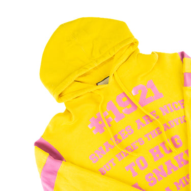 The design of the Gucci 1921 Print Yellow Hoodie.
