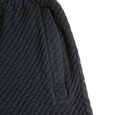 The detail of the Represent Black Ottoman Shorts.