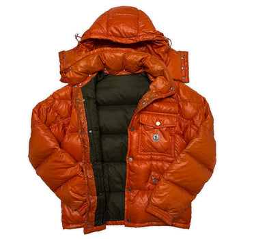 The inside of the Moncler K2 Orange Puffer Jacket.