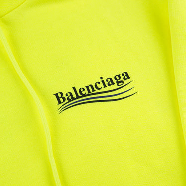 The logo of the Balenciaga Neon Yellow Campaign Hoodie.