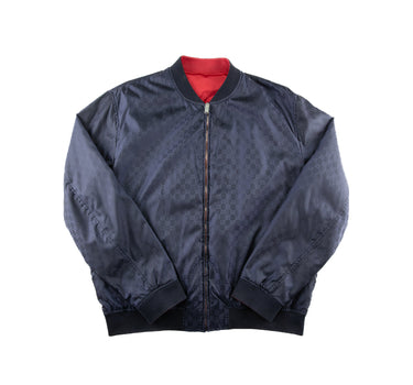 The one side of the Gucci Monogram Reversible Bomber.