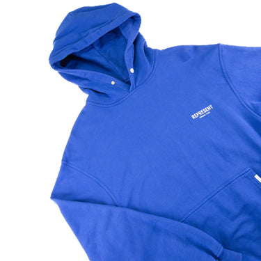 The front of the Represent Owners Club Blue Hoodie.