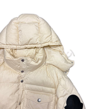 The hood of the Moncler Twist Huarez Cream Puffer Jacket.