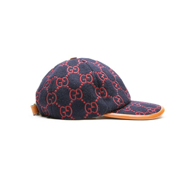 The right of the Gucci Embroidered GG Canvas Baseball Hat.