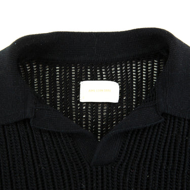 The collar of the Aime Leon Dore Mesh Knit Black Polo.