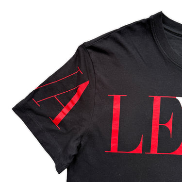 The logo of the Valentino Red Logo Black T Shirt.