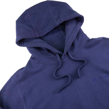 The hood of the Aimé Leon Dore Logo Navy Hoodie.