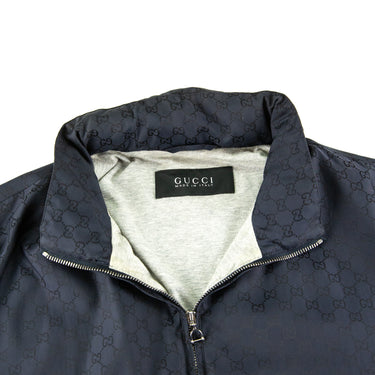 The collar of the Gucci Navy Monogram Jacket.
